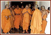  At 7.00 a.m. Swamishri comes out from his room, humbly bowing to all as he goes towards the Yagnapurush Smruti Mandir 
