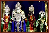 Shri Harikrishna Maharaj and deities gorgeously attired for the festival
