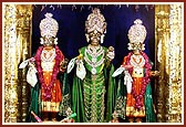 Shri Gunatitanand Swami, Shri Sahajanand Swami and Shri Gopalanand Swami adorned for the festival of colors