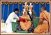 Swamishri inaugurates Swaminarayan Satsang Darshan video cassette on the murti-pratishtha festival in New Delhi and VCDs on past festivals