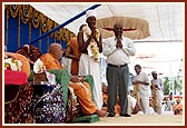 Newly initiated parshad, a BS Computer Science graduate from USA, and parent with Swamishri