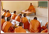 A class conducted by a senior sadhu at the training center