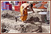 A sadhu engaged in service