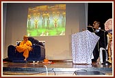 Swamishri watches the entertaining and informative skit