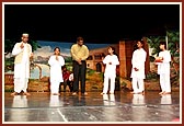 Children present the 'Khoj' drama