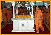 Swamishri doing darshan and circumambulating the shrine at Yogi Smruti Mandir 