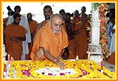 Swamishri doing darshan and circumambulating the shrine at Yogi Smruti Mandir 