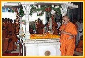 Swamishri doing darshan and circumambulating the shrine at Yogi Smruti Mandir 