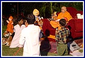 Swamishri engaged in a puppet show of 'Valero Varu'