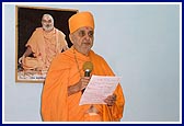 Swamishri gives a moral message to children in a class