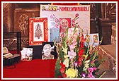 Birthday greeting cards displayed in Swamishri's morning puja