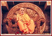 Swamishri engrossed in doing the rosary during the celebration  