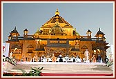 A view of the stage with the beautifully lit Akshardham monument in the background 