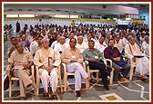 Scholars seated in the audience