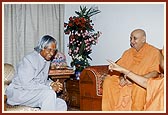 The President engaged in spiritual discussion with Swamishri