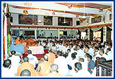 Swamishri's morning puja in the mandir hall