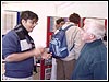 Child Volunteer guiding at the exhibition