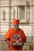 Harikrishna Maharaj and Swamishri in the colourful garden adjoining the Mandir