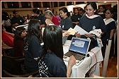 Devotees receiving their certificates after the Walk