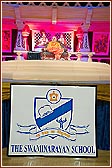 Swamishri attending The Swaminarayan School presentation