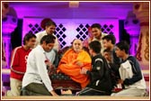 Kishores from the winning team speak with Swamishri