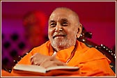 Swamishri seated in the assembly