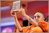 Swamishri opens a DVD titled Mare Angane Swami Padharya - Part 1