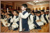 Children sitting through the programme