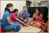 Devotees participating in the mahapuja vidhi