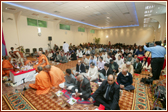 Devotees participating in the mahapuja vidhi