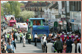 The beautifully decorated chariots passing through Ealing Road