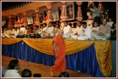 During Swamishri's walk youths sing kirtans