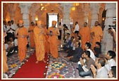 Swamishri meeting devotees in the Mandir