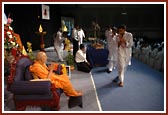 Kishores individually greet Swamishri at the end of the programme
