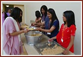 Kishoris serving breakfast
