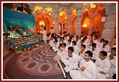 Kishores singing a kirtan in the mandir