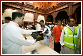 Delegates collecting their Shibir packs