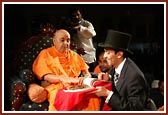 Swamishri being shown a copy of the Shikshapatri