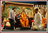 Swamishri opens the newly-released Sahaj Anand DVD