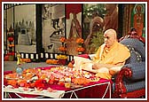 Swamishri doing morning pujaSwamishri performing morning puja