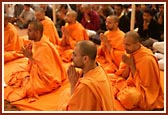 Sadhus of BAPS Swaminarayan Sanstha join the assembled congregations in prayer