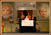 Rt. Hon. Charles Kennedy MP presents the BAPS cheque to Mr Ye Min Tum, 2nd Secretary from The Embassy of the Union of Myanmar