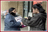 BAPS volunteers collecting funds for India Earthquake 