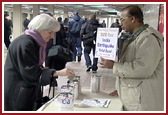 BAPS volunteers collecting funds for India 
Earthquake 