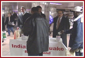 BAPS volunteers collecting funds for India 
Earthquake 