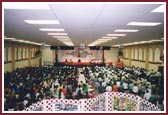 Devotees in evening assembly