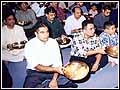 Devotees performing Arti 