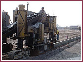 Construction of curb for road and parking lot  