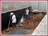 Ground work near retaining wall  
