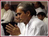 Devotees engage in prayer   